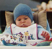 Erik (3 months) camping, high chair