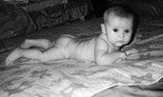 infant on large soaker pad